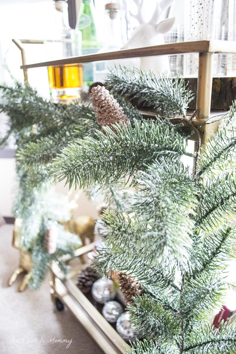 How To Decorate Your Home For The Holidays With Big Lots; trim your bar cart with a garland