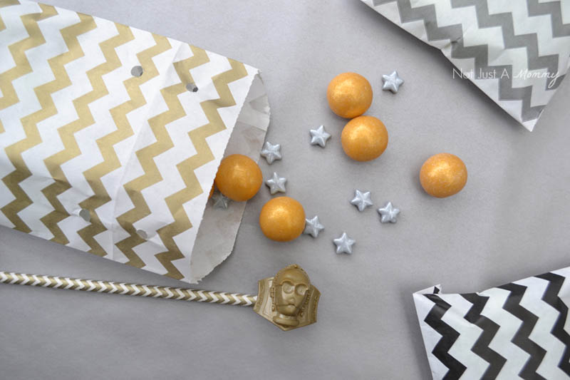 Fill Star Wars party favor bags with fun treats and candy