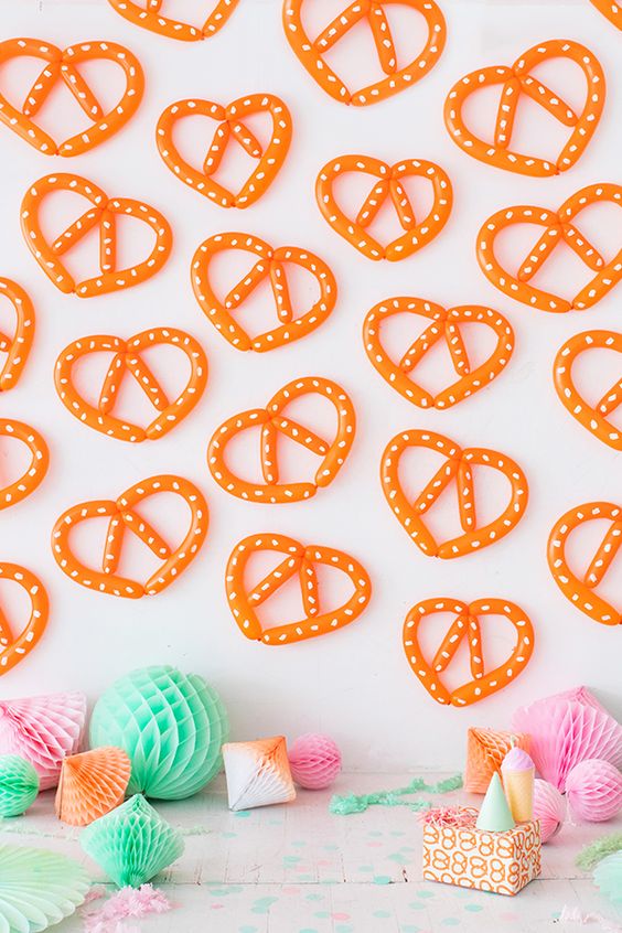 11 Favorite Foods Party Ideas; pretzel backdrop