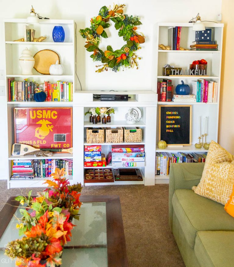 7 Tips To Transition Your Living Room From Summer to Fall; front of bookshelves