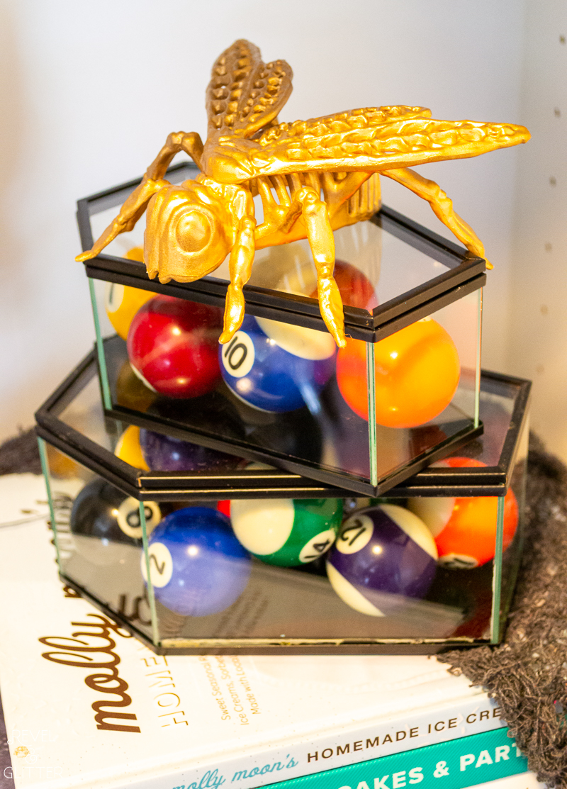 How to Style Bookshelves For Halloween; mini billiard balls