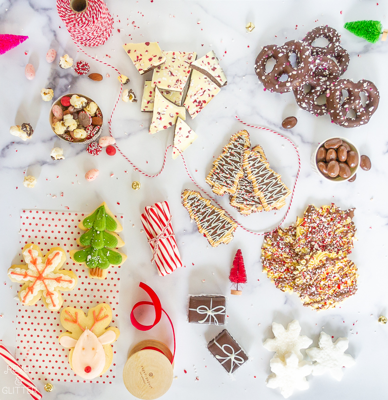 Create a holiday cookie box with store-bought treats; flatlay of goodies