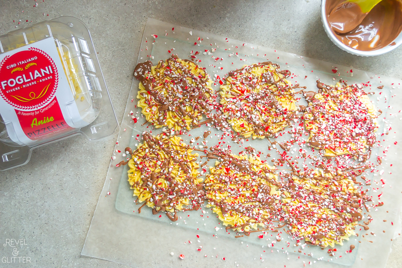 Create a holiday cookie box with store-bought treats; drizzled pizzelle cookies