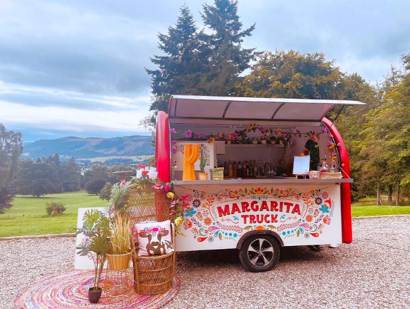 10 Hot Party Trends for 2024; a margarita truck in a field