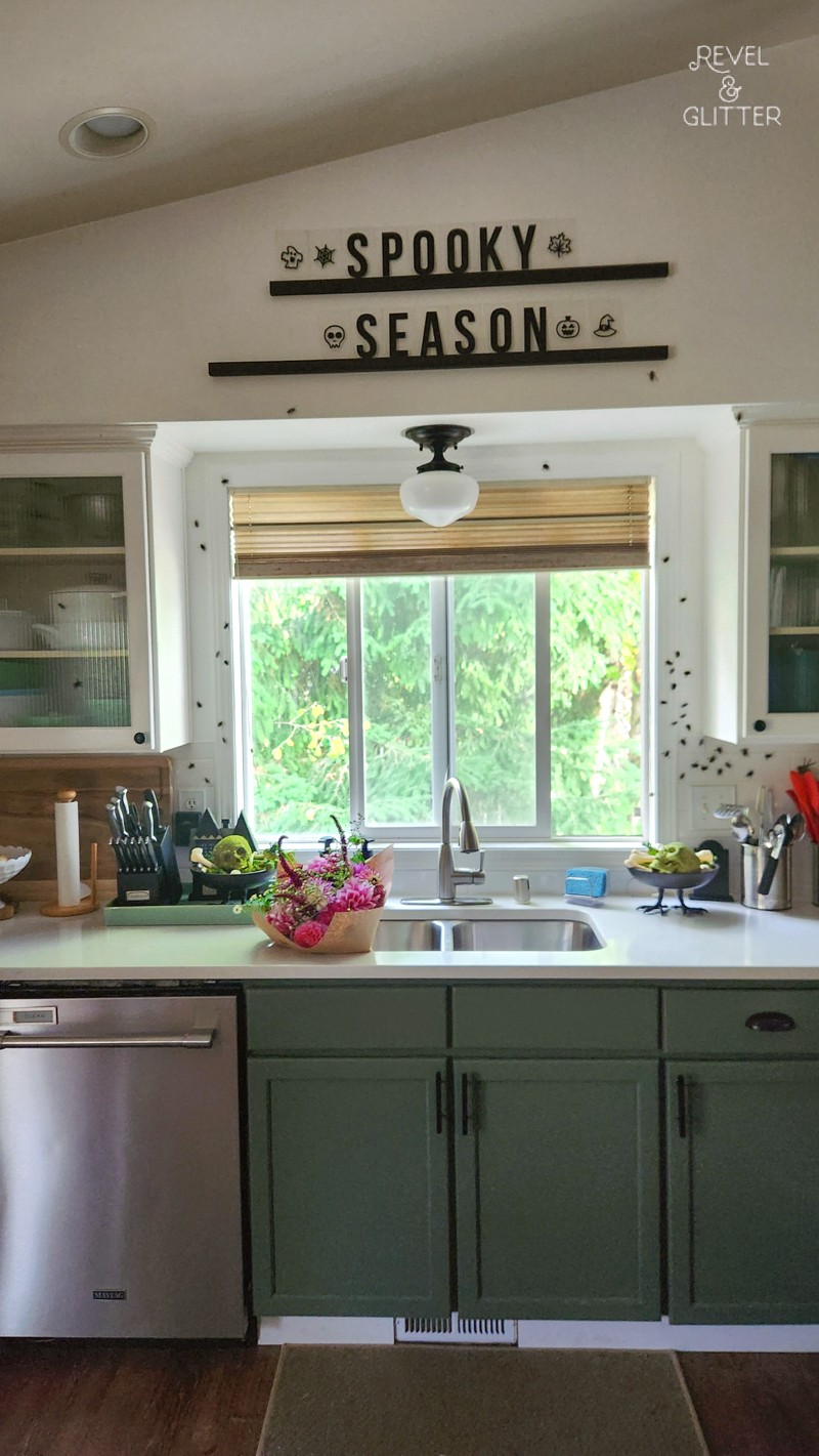 Stylish Halloween Decor Ideas with a Modern Touch; kitchen with marquee sticks with a Halloween message
